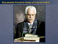 slide 11 photo of iraqi carrying documents found in home